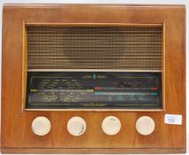 A vintage wooden cased Bush AC 10 valve radio,