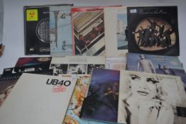 A collection of vinyl Long Play  ( LP ) records to include Pink Floyd, David Bowie, The Beatles,