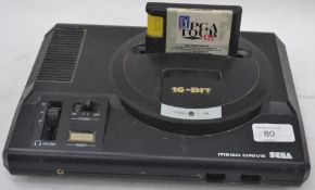 A retro Mega Drive games console in working order with all leads and a Golf Game

UK,