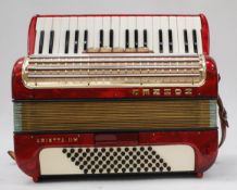 A cased Hohner Arietta 11m Accordion complete with the straps.