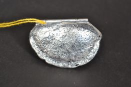 A silver plated vesta cases in the shape
