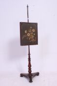 A 19th century Georgian mahogany pole sc