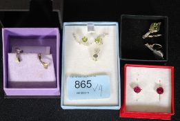 Three pairs of silver metal earrings sta