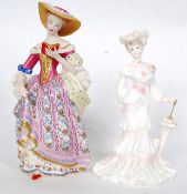 Two boxed figurines to include a Coalpor