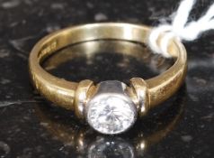 An 18ct gold, platinum and diamond singl