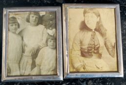 Two antique silver hallmarked miniature photograph frames - each containing original photographs