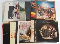 A collection of vinyl Long Play records to include multiple Wings,