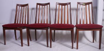A set of 4 1970's G-Plan high back teak wood dining chairs.