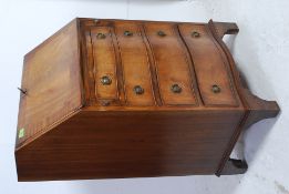 A very good reproduction serpentine fall front mahogany bureau of smaller proportions,