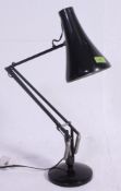 A vintage retro black Herbert Terry anglepoise adjustable lamp. Measures: 15cm diameter.