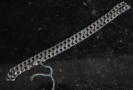 A silver curb gentlemans chain necklace of chunky form. Total weight 62.