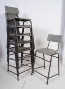 A set of 6 retro school / industrial stacking laboratory chairs - dining chairs raised on tubular