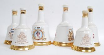 A collection of 6 ceramic Bells Whisky Bells of commemorative Royal Interest,