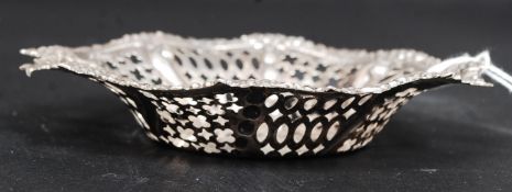 A silver hallmarked fret worked bon bon dish bearing London hallmarks with illegible makers marks.