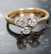 An 18ct gold and diamond ladies 3 stone ring.