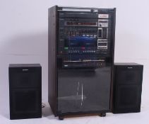 A retro 1980's hi-fi system by Sony  model Z3000 having a seperate Goodmans CD player set within a