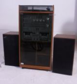 A vintage Amstrad 1980's Hi Fi comprising of record deck, tape deck, receiver,