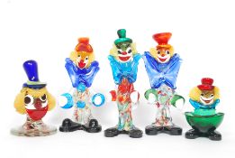 A group of 5 Murano coloured / studio glass clowns to include an unusual clown bust and a clown ash