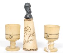 A pair of Sudanese small ivory cups,