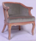 A French 20th century limed beechwood show wood framed fauteuil armchair.