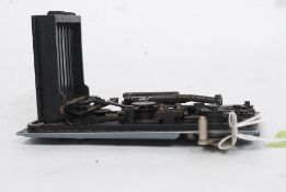 A 2nd World War Air Ministry Gun Camera lens shutter part.