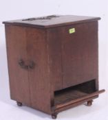 A Victorian oak arts & crafts coal purdonium.
