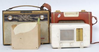 A vintage 1950's Alba radio together with an Eveready  portable radio,