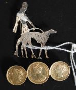 A silver Art Deco style brooch stamped 925 of a lady walking a dog together with a 3 coin Queen
