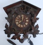 A good early 20th century Black Forest carved cuckoo clock.