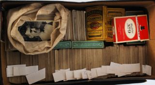 A large collection of assorted vintage cigarette cards - many examples,