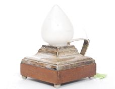 A 1920's silverplate and mahogany battery operated chamberstick - bedside go-to-bed lamp marked