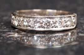 An 18ct gold and diamond ladies half eternity ring.