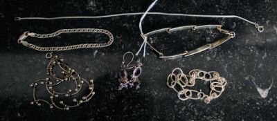A collection of silver to include bracelet, earrings with stones, necklaces,