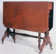 A Victorian mahogany sutherland table.
