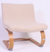 An Ikea Poang cantilever bentwood armchair having being upholstered frame.