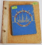 A vintage Nelson stamp album, along with another.