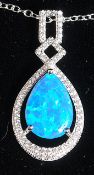 A silver white metal cz pear shaped opalite pendant necklace