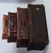 A stack of vintage suitcases of graduating size dating to the 20th century  ( see illustrations ).