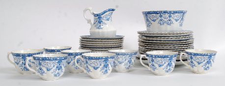 A vintage Royal Albert blue and white pattered tea service to include cups, saucers, plates etc.