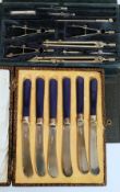 A vintage mathematics set complete in the box together with a cased set of 20th century silver