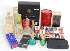 A large collection of ladies perfumes to include Christian Dior Dune, Mrs Wright,