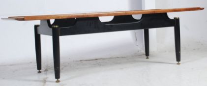 A retro Lebrenza teak coffee table standing on tapered legs. Measures: 40 x 135 x 50.