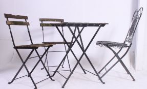 A vintage style cast metal, bistro, folding table and chairs garden set,