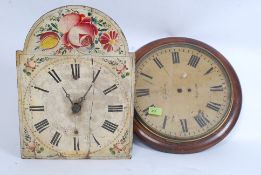 An antique long case grandfather clock face and movement, with hand painted dial,