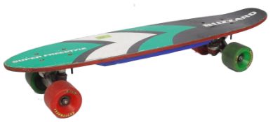A vintage original retro 1970's Blizzard Freestyle skateboard having green and red fitted