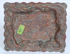 An unusual 19th century copper and brass embellished Chinese dragon tray.