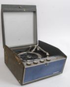 A vintage Ferguson record player with a Garrard deck. Within the original case.