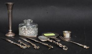 A collection of continental silver and white metal items to include a Dutch silver christening