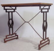 A vintage upcycled Victor Sewing machine table converted to a lamp table having new oak planked top