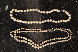 Two sets of pearls - one marked ' silver ' to the clasp